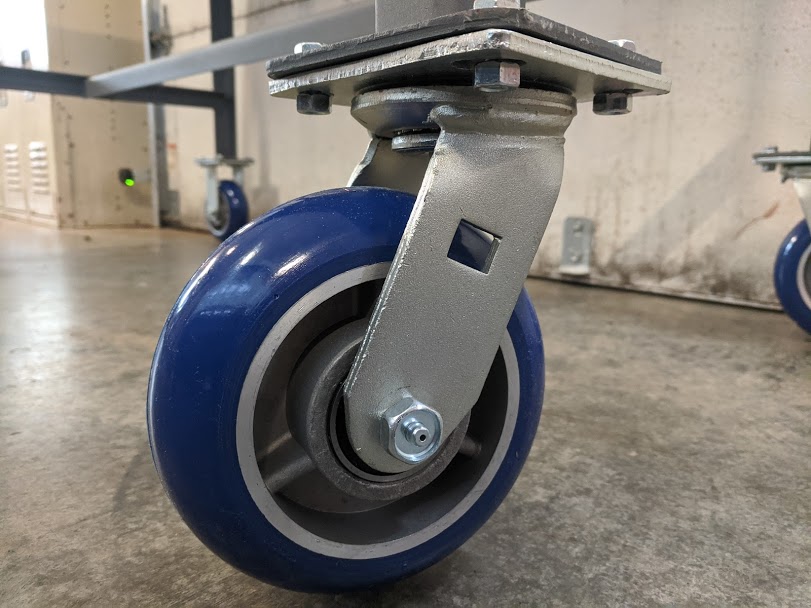 heavy duty ergonomic swivel caster 6 x 2 round tread polyurethane wheel.